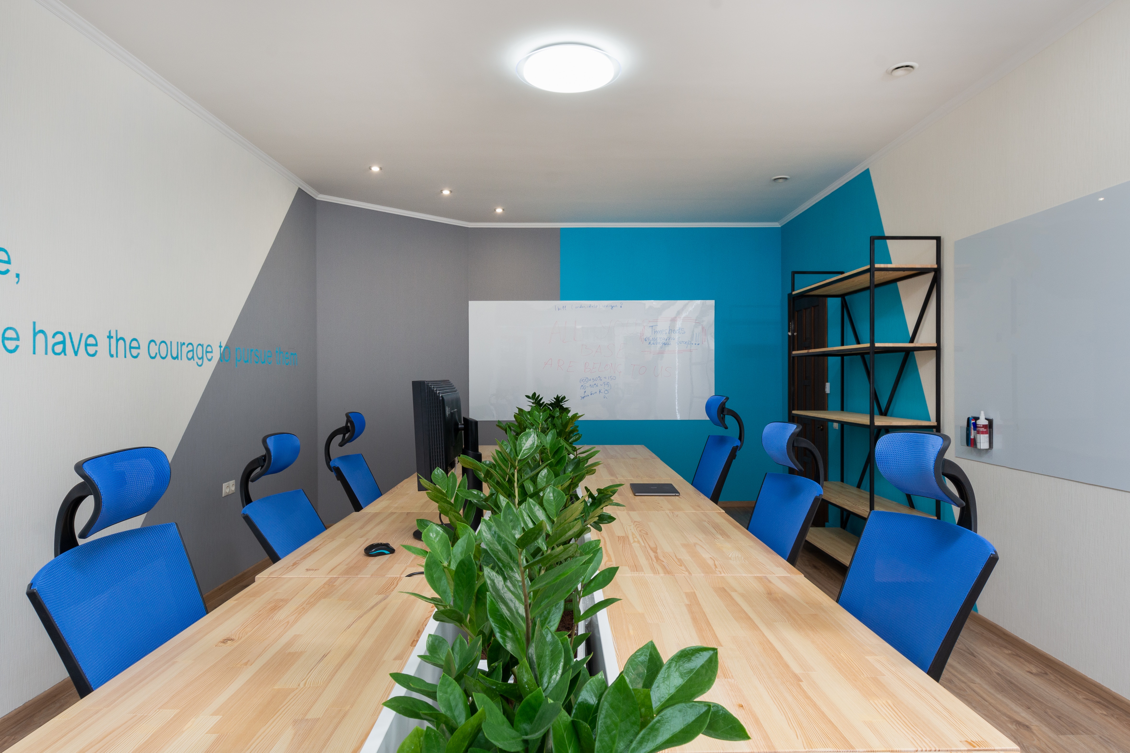 conference room with plants in the middle